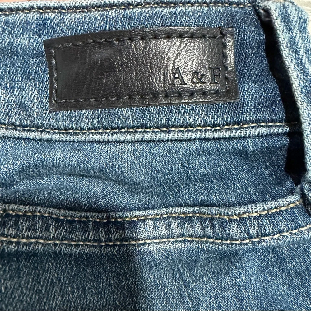 2/$25 Abercrombie & Fitch Blue Distressed Harper Low Rise Skinny Boot Cut Jeans - Picture 6 of 7